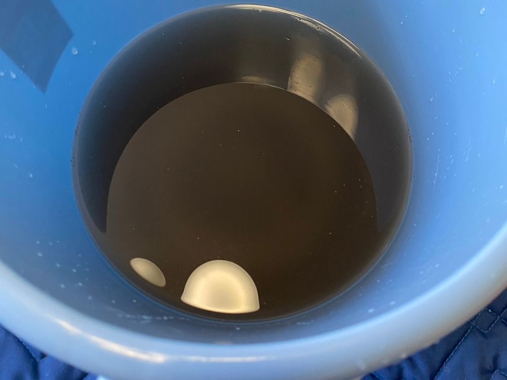 神戸市中央区海岸通　お掃除機能付きエアコンの分解洗浄後の廃水